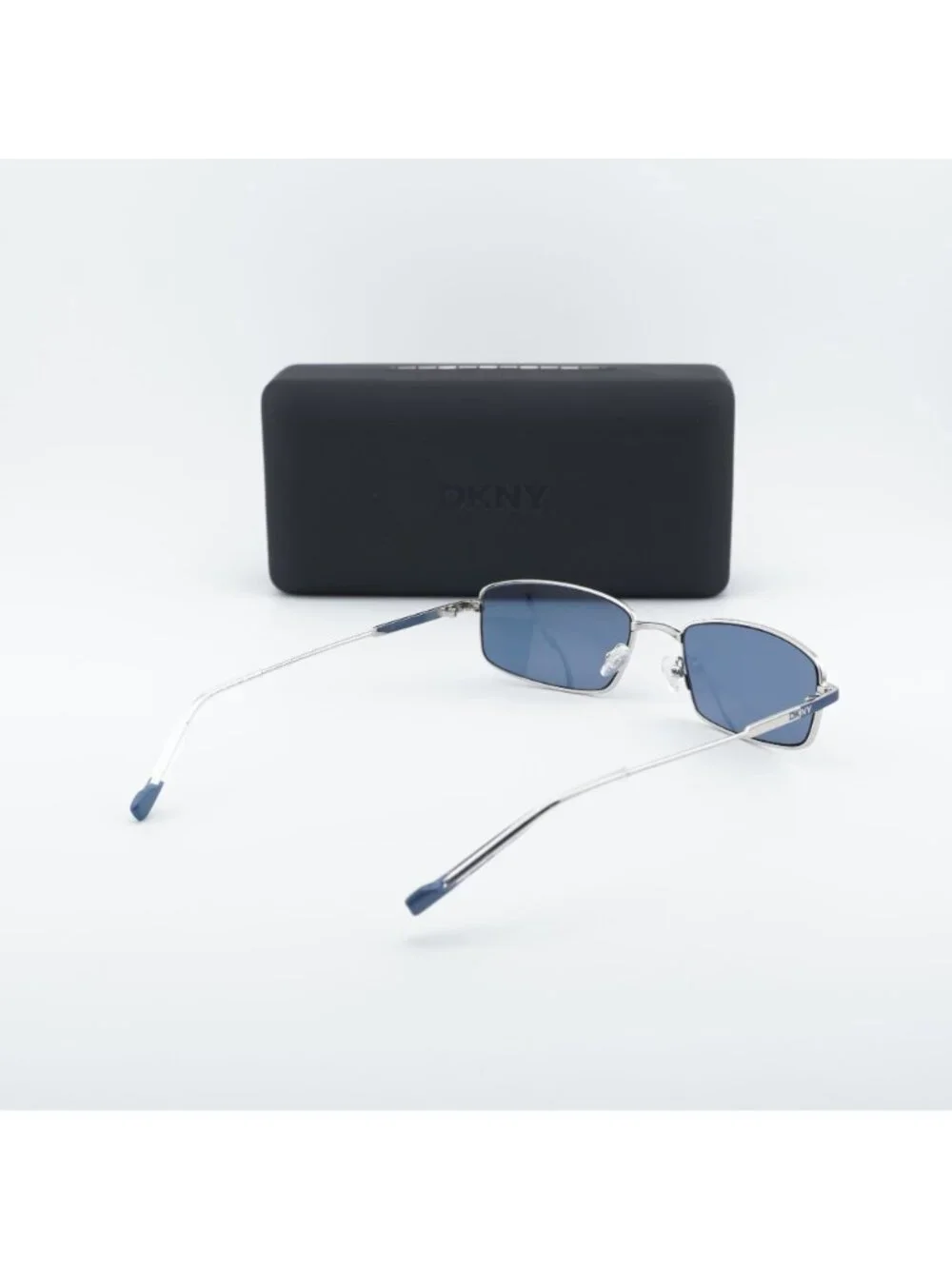 DKNY DK119S 040 Sunglasses Silver Rectangle Frame, Blue Lenses